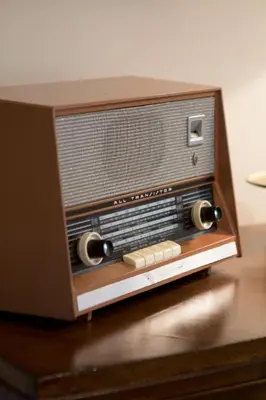 an old radio sitting on top of a table at OHH -S João apartments- Riverside in Porto