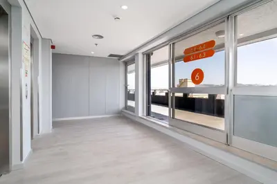 an empty hallway with windows in a building at STAYSOME Porto Herculano in Porto