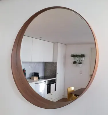 a mirror hanging on a wall in a kitchen at Porto Feeling in Porto