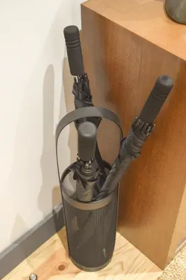 a black holder with two microphones in a wall at Suite In in Porto