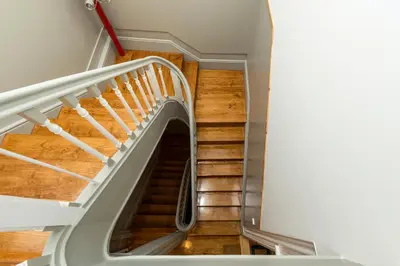 a staircase in a house with wooden floors at Fontainhas River Residence in Porto