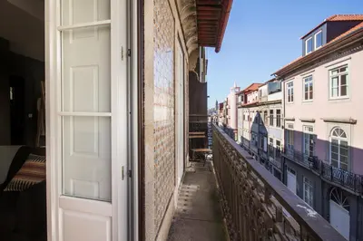an open door to a balcony of a building at Formosa 79 Apartments by Guestify in Porto