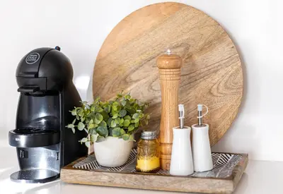 a counter top with a coffee maker and a mirror at Blue House Porto Apartments - Parking in Porto