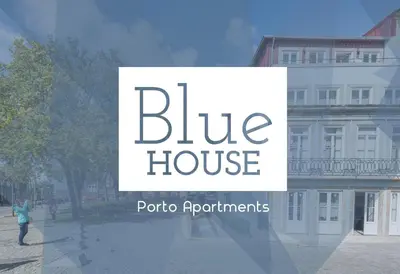 a blue house sign on the side of a building at Blue House Porto Apartments - Parking in Porto