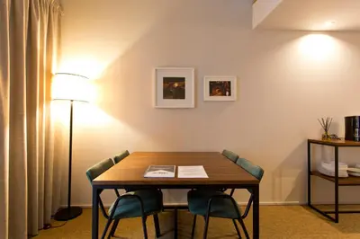 a dining room with a table and chairs at RVA - Gustave Eiffel Apartments in Porto