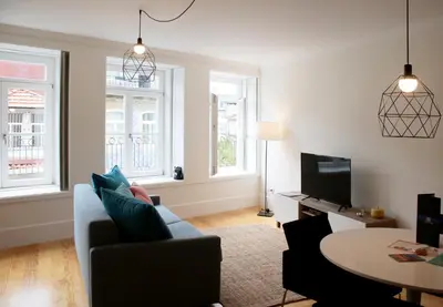 a living room with a couch and a table at HM - Carlos Alberto Apartment 3 in Porto