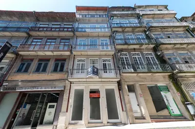 an old building in the city of paris at LovelyStay - Rico's Apartment - Almada 1ºF in Porto