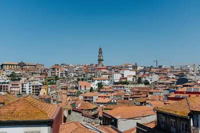 a view of a city with buildings and roofs at Cozy Stay - Cedofeita 436 in Porto