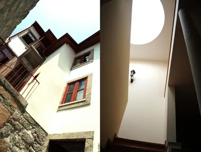 a view of a building from a hallway at The Poets Inn in Porto