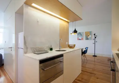 a kitchen with a sink and a counter top at Liiiving in Porto | Central Secret Balcony in Porto