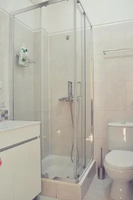a bathroom with a shower and a toilet at A Casa da Maria in Porto