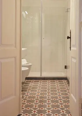 a bathroom with a shower and a toilet at Downtown Colosseum Apartments in Porto