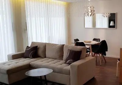 a living room with a couch and a table at Min Porto Inn in Porto