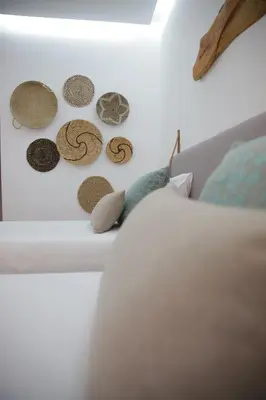 a bedroom with a bed with hats on it at Braancamp 65 in Porto