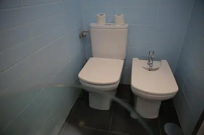 a bathroom with a toilet and a sink at Braancamp 65 in Porto