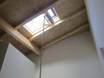a skylight in the ceiling of a loft at Oporto City Cottage in Porto