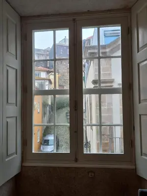 a kitchen with a sink and a microwave at Vitoria Studio Residence II - Downtown in Porto