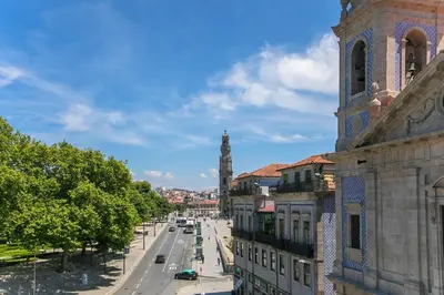 a view of a city street with a clock tower at Casa da Cordoaria by Oporto Soul in Porto