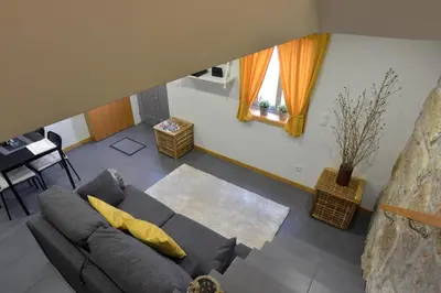 an overhead view of a living room with a couch at Oporto Memory Houses 7 in Porto