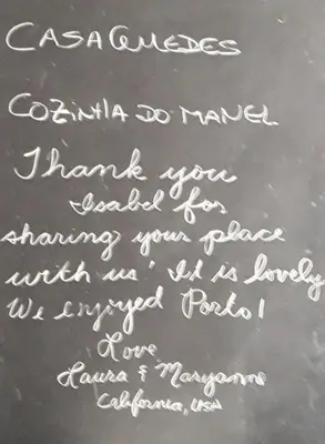 a chalkboard with writing on it at Oporto Memory Houses 7 in Porto
