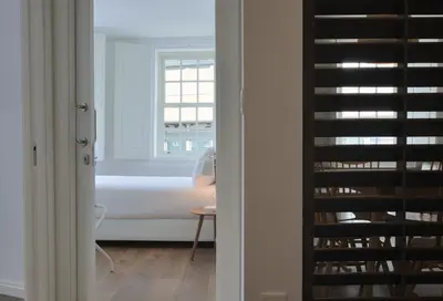 a room with a bed and a window at Spot Apartments Casa Januario in Porto