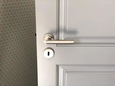 a door with a nickel door knocker on it at Casa da Catedral II in Porto