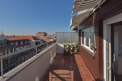 a balcony with a view of a city at Alexandre Herculano Oporto Residence I II & III in Porto