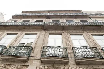a building with balconies on the side of it at The Gate Porto in Porto
