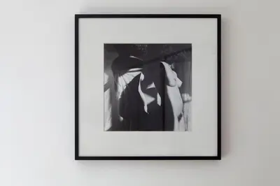 a black and white picture of a woman on a wall at Casa Rosa in Porto