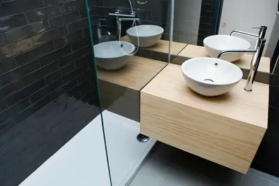 a bathroom with two sinks and a mirror at Oporto Cool - Fontainhas in Porto