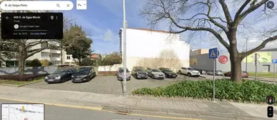a bunch of cars parked in a parking lot at Cozy Apartment Casa da Música in Porto
