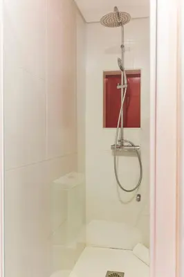 a bathroom with a shower and a toilet at APOSENTUS - Your Home at Pinheiro's Studio in Porto