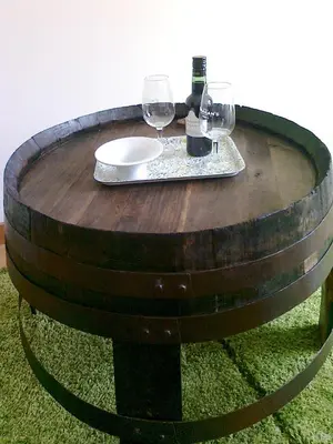 a wooden table with wine glasses on top of it at Formosa Oporto Apartments Group in Porto