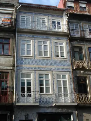 a blue and white building with windows and balconies at Formosa Oporto Apartments Group in Porto