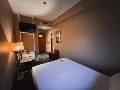 a hotel room with a bed and a desk at Stay Hotel Porto Centro Antas in Porto