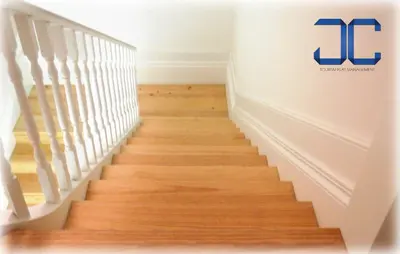 a staircase in a home with wood flooring at #Four Apartment by JC in Porto