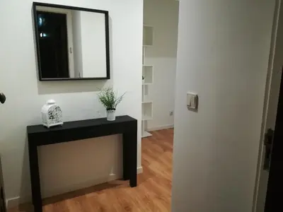 a bathroom with a black table and a mirror at RS Porto Vilar in Porto