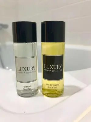 two bottles of oils sitting on a shelf at Sé Boutique Apartment in Porto