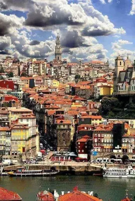 a view of a city with a river and buildings at Sé Boutique Apartment in Porto