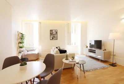 a living room with a couch and a table at HM - Ribeira São João 5K in Porto