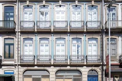 a building with balconies on the side of it at LovelyStay - Oren Duke's House in Porto