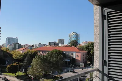a view of a city from a building at Galizia Flat in Porto