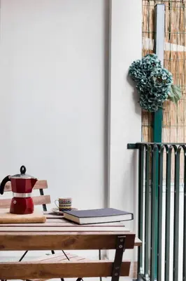 a table with a tea pot and books on it at Best Of Porto Apartment - BOP in Porto