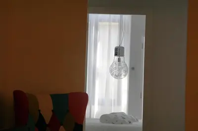 a kitchen with a table with a bowl of fruit on it at Stylish house - air cond, breakfast, free parking, by Porto with Love LDA in Vila Nova de Gaia
