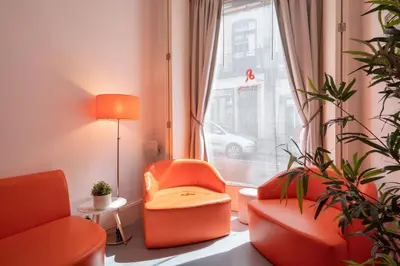 a bathroom with a toilet and a sink and a shower at Porto Lounge Hostel & Guesthouse by Host Wise in Porto