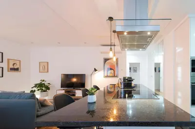 a living room with a table and a couch at Bruno's Downtown Apartment in Porto