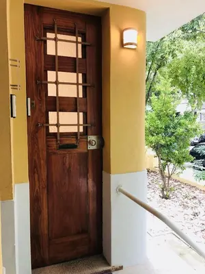 a wooden door on a building with at BS VILLAS RC PORTO in Porto