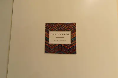 a picture of a sign on a wall at Naya-Downtown Guesthouse in Porto