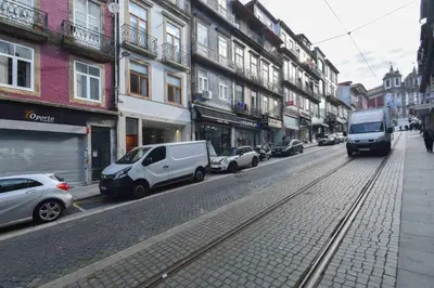 a street with cars parked on the side of the road at January's 31 Studio by DA'HOME in Porto