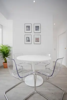 a white table and chairs in a room at Liiiving in Porto | Center Spot Apartment in Porto